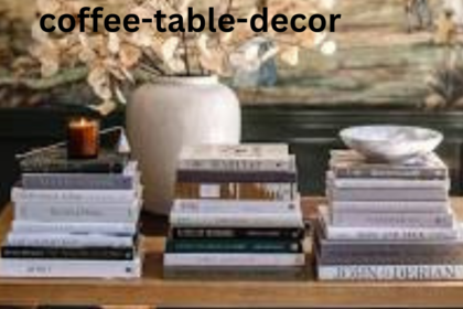 The book at the very bottom of the rightmost stack has clear, readable text on its spine: