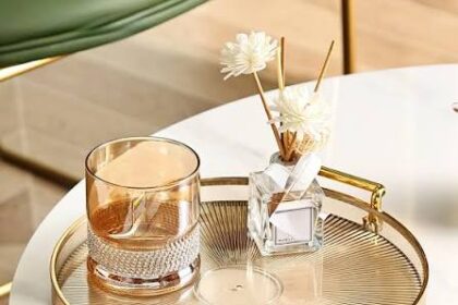 Add elegance to your home with a stylish glass tray decor setup. Pair decorative candles, reed diffusers, and modern accessories on a gold-rimmed glass tray to create a sophisticated centerpiece for your coffee table, dining table, or living room.
